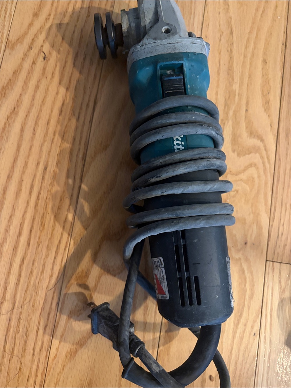 Makita Corded Angle Grinder in Teal and Black
